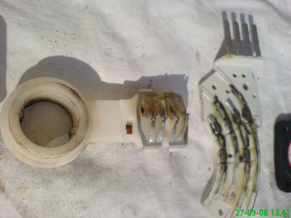 Damaged electrical connector with burnt wires