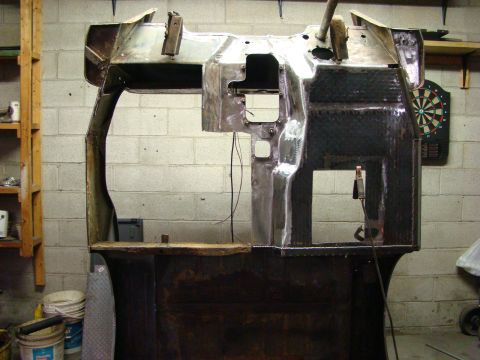 1948 Jeep Wrangler - Unidentified metal body shell, likely a dashboard and firewall section, undergoing restoration or fabrication.