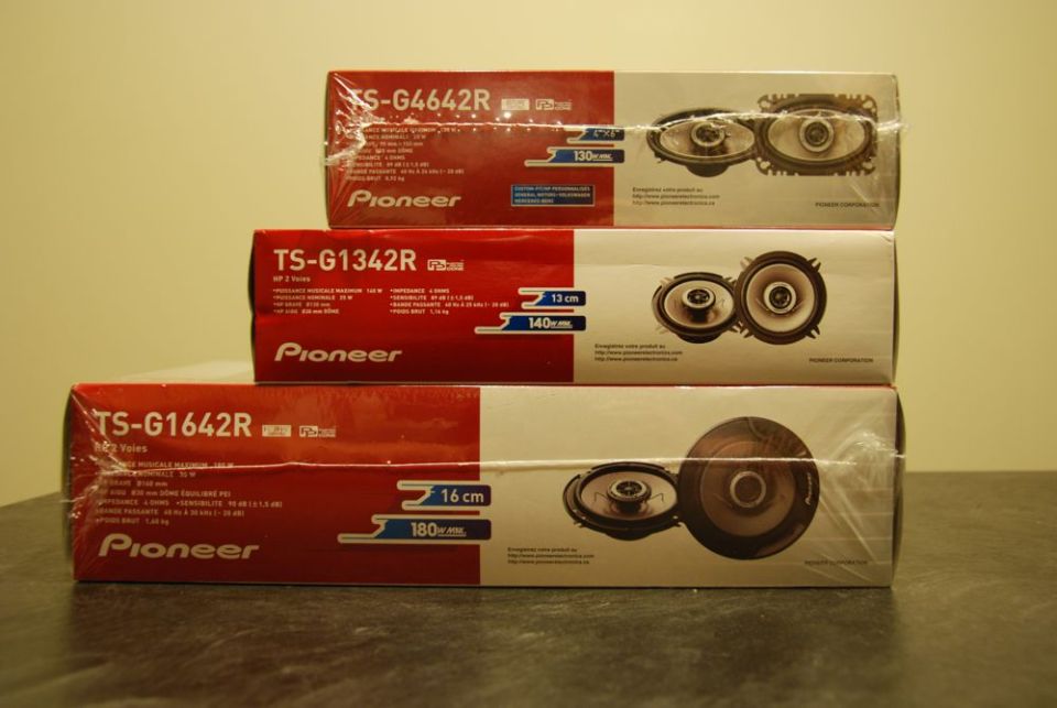 Three stacked Pioneer speaker boxes with model numbers TS-G4642R, TS-G1342R, and TS-G1642R