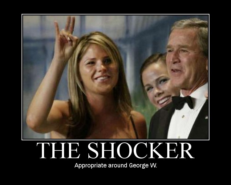 Woman making a hand gesture with George W. Bush and another woman behind her