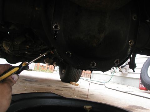 1989 Ford Bronco - First, off with the tires and on a pair of stands. Make sure you secure the vehicle. Drain the rear of oil. There's 10 bolts...I used my ai…