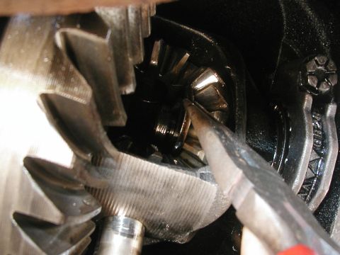 1989 Ford Bronco - Once the bolt is out, the pinion shaft should slide freely out and down. Mine stopped just short of coming all the way out, so I left it th…
