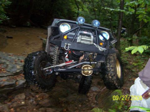 1992 Jeep Cherokee - Modified Jeep Wrangler navigating a challenging rocky off-road trail. Date stamp indicates 09/27/2008.