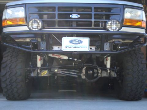 1996 Ford Bronco - Sits much higher. Original install had the u-bolt end under the draglink & the other side hanging way down under the yellow Accel sticker,…