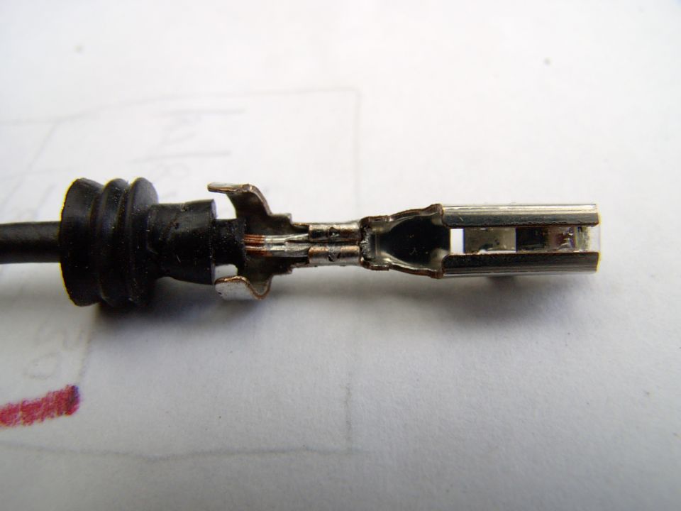 There's no need to try to pry open the next tang as you'll never get 12 gauge wire to fit where the 18 gauge was. Just leave it and cut it flush with a carpet knife, I solder right over it/to it anyway.