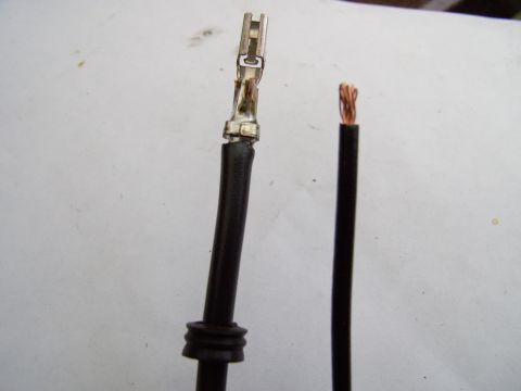 1990 Lincoln Town Car - Slip the grommet over the new 10 gauge wire, crimp the outer tangs onto the wire and solder it solid.