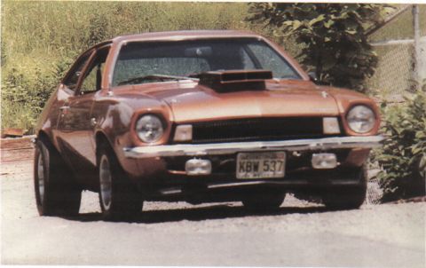 1978 Ford Mustang II - This modified 1977 Ford Pinto coupe features a prominent hood scoop and aftermarket wheels.