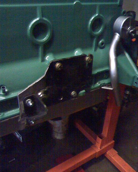 1953 Ford Mainline - Close-up view of an engine block with a bolted metal bracket and a visible oil filter housing.