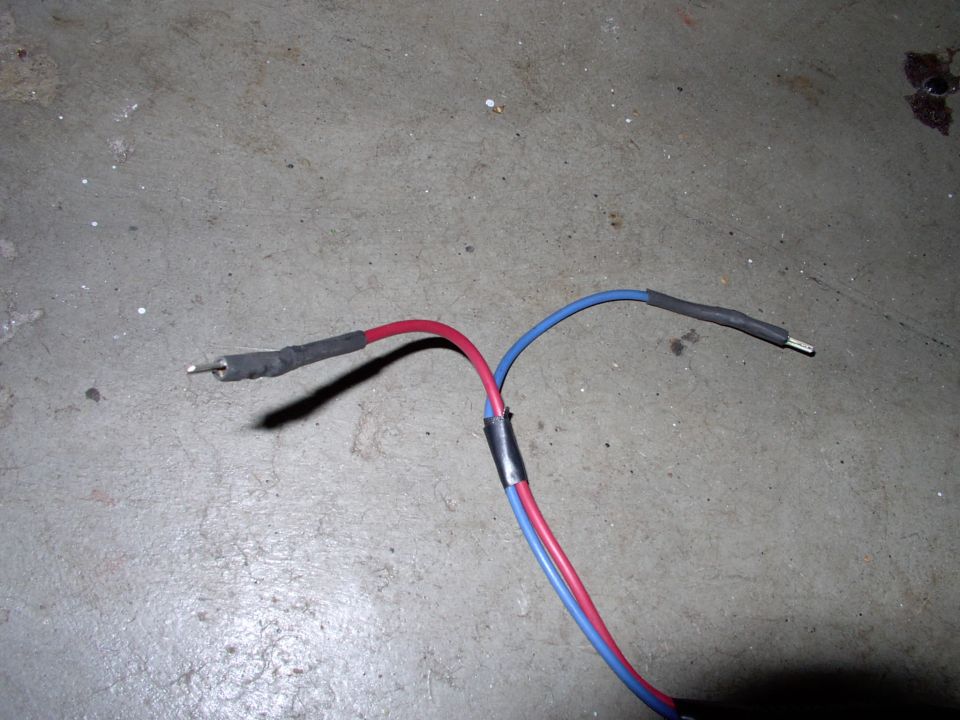 A close up of the weatherpack type connectors I'm using to stick in the stock headlight plug to activate the relays.