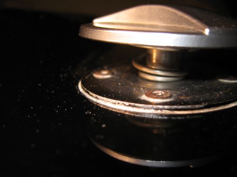 1968 Shelby GT500 - Detail shot of a hood pin rivet, showing its mounting hardware and spring mechanism.