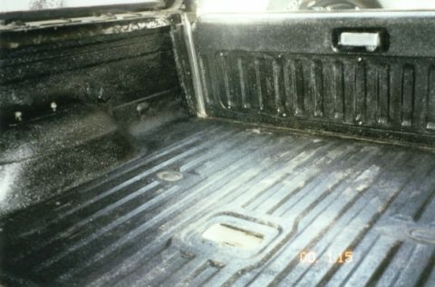 1994 Ford Bronco - My footprints in the back on the new liner. (Date is wrong.)
