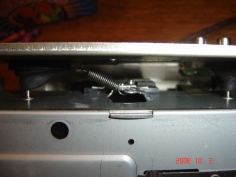 1993 Ford Bronco - Close-up of an internal mechanical component, possibly from electronics.