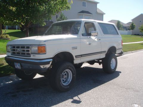 1987 Ford Bronco - This lifted 1987 Ford Bronco features aftermarket wheels and a prominent stance.