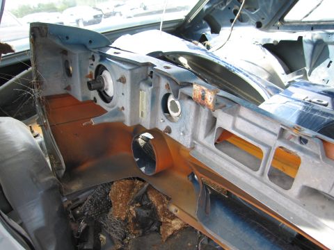 1991 Ford LTD Crown Victoria - The interior dashboard of a vehicle is shown, with significant dismantling and exposed components visible.
