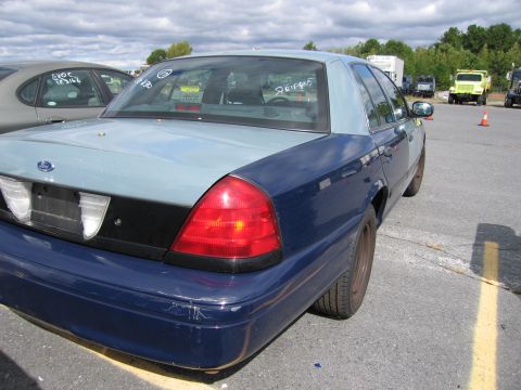 1991 Ford LTD Crown Victoria - This 1991 Ford Crown Victoria LTD features a distinctive two-tone paint scheme, with the rear in blue and the upper body in light blue.