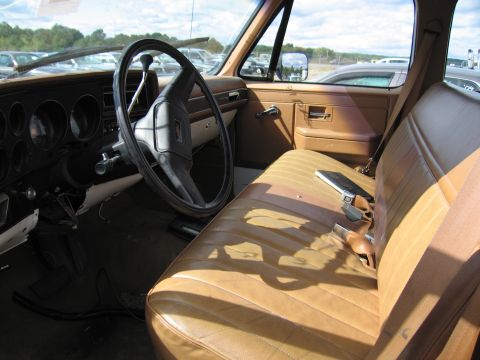 1991 Ford LTD Crown Victoria - Interior view of a truck, showing the tan seat and dashboard.