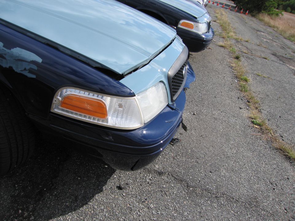 Front of a 1991 Ford Crown Victoria LTD with a light blue hood and dark blue fenders