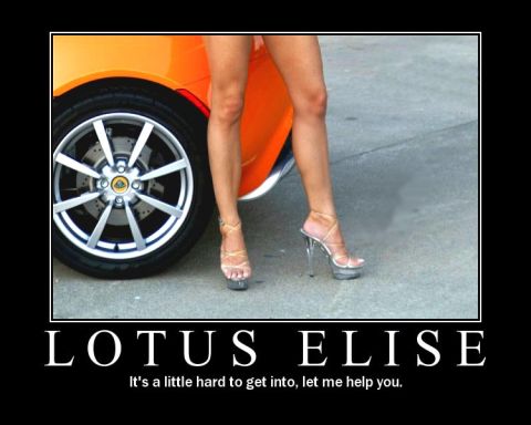 1973 Ford Ranchero - A woman in high heels poses next to an orange Lotus Elise.