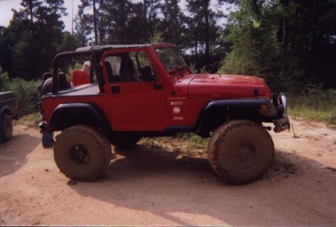 1989 Ford Bronco - Big Red jeep, it was built for the rocks, but tried hummer hole to no avail, so i pulled him out too
