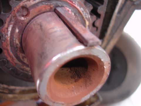 1993 Ford Taurus - A close-up view of a metal shaft with a keyway, showing signs of rust and wear.