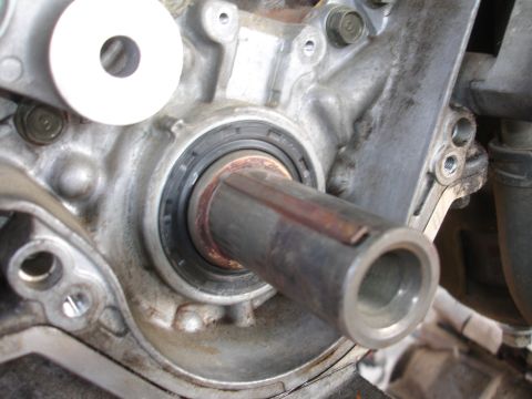 1993 Ford Taurus - This is a close-up view of a vehicle's engine crankshaft seal and the shaft it protects.