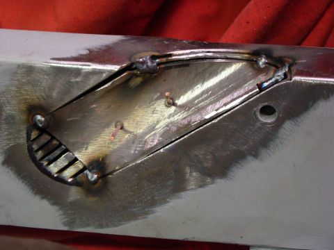 1948 Jeep Wrangler - This photo shows a section of a vehicle frame that has undergone welding repairs.