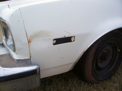 1976 Ford Torino - Closer view of the dent on the left front fender and the missing marker lens. Both tabs are there so a replacement will be easy to install…