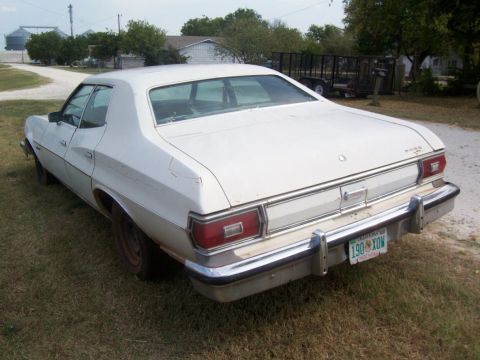 1976 Ford Torino - View of the left rear of the car, notice the fiberglass inserts between the bumper and the body are all there (if slightly squished on one…
