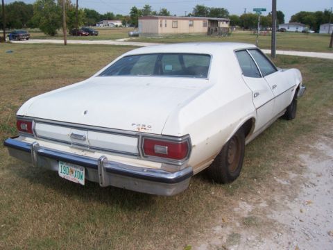 1976 Ford Torino - There are a few small dents on the right side, moreso than the left, and the whole quarter molding is missing. You can see some rust under…