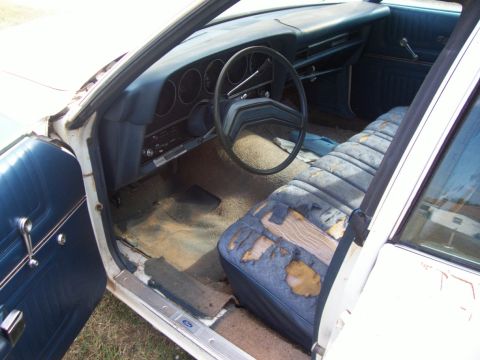 1976 Ford Torino - This is the view when you open the driver's door. Looks pretty ratty with the upholstery and carpet but those are easily replaced.
