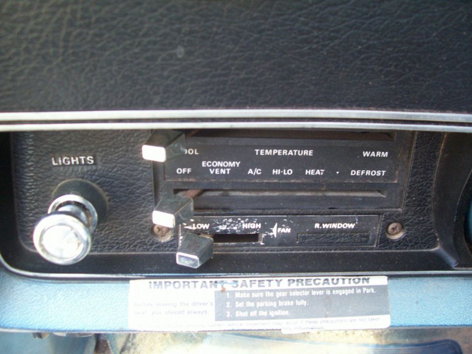 Here are the controls for the lights and air conditioning.  I'll try and restore the AC controls and get a new "transmission warning" sticker.