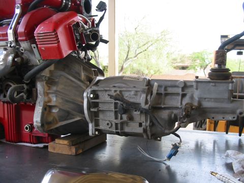 1993 Ford Taurus - Engine and transmission assembly, likely from a truck or heavy equipment, is shown disassembled.