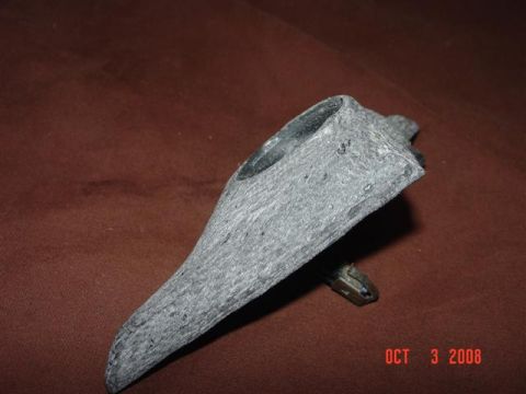 1993 Ford Probe - A gray custom car part is shown against a brown background. The part has a textured surface and a mounting bracket is visible at the rear.