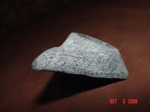 1993 Ford Probe - A close-up view of an unidentified automotive part is shown with a date stamp and website in the lower right corner.