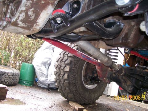 1984 Ford Bronco - Close-up view of the undercarriage, suspension, and a large off-road tire, with a date stamp of 02/03/2008.