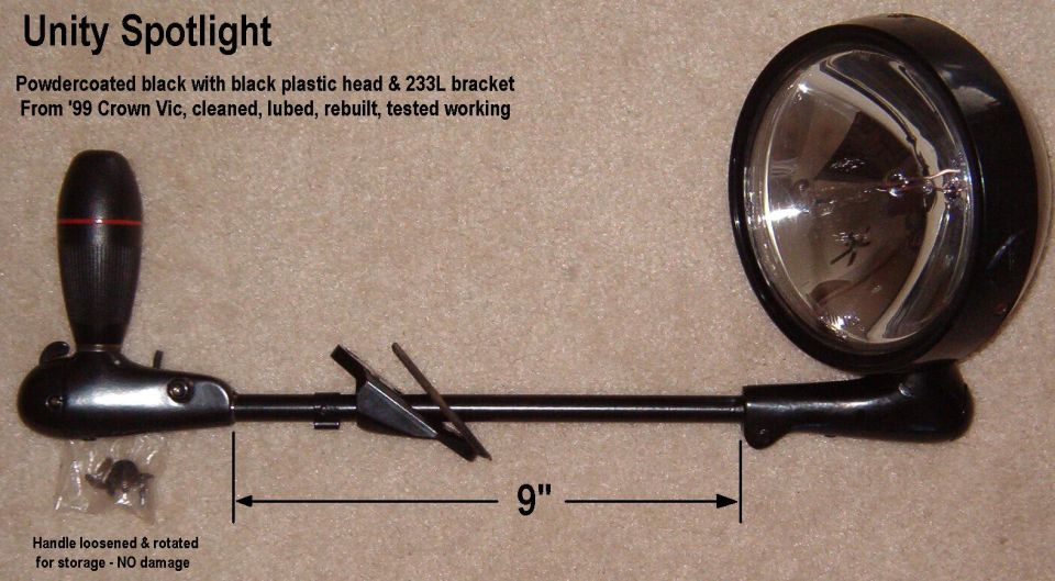 Black Unity spotlight with handle on white background, labeled and measured