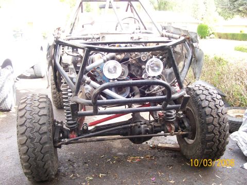 1984 Ford Bronco - Front view of a custom off-road buggy chassis, showing the engine and suspension components.