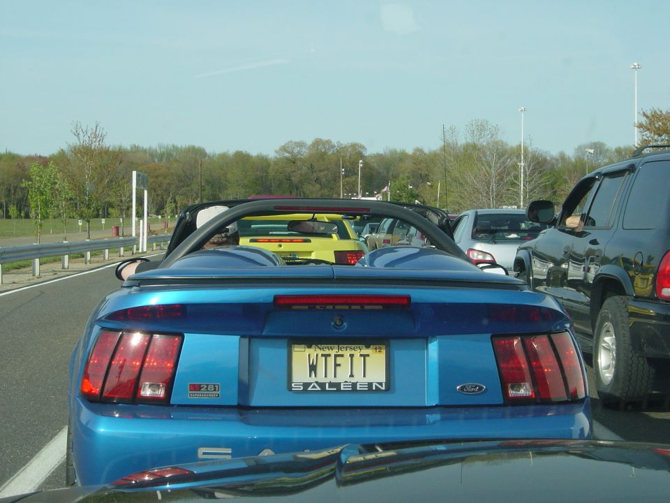Blue 2001 Ford Mustang convertible rear view with Saleen badging