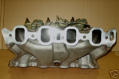 1972 Ford Ranchero - This intake manifold features four carburetors, suggesting a high-performance engine setup.