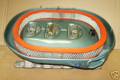 1972 Ford Ranchero - Tri-power carburetor air cleaner assembly with orange filter element and metal base.