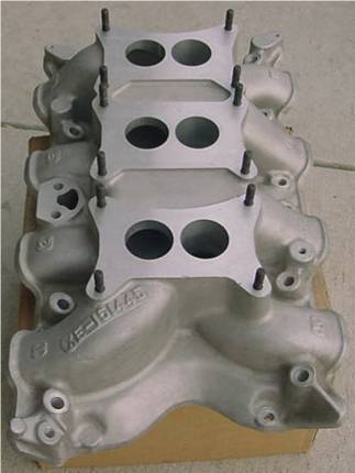 1972 Ford Ranchero - This is an aluminum intake manifold with three carburetor mounting plates, viewed from above.