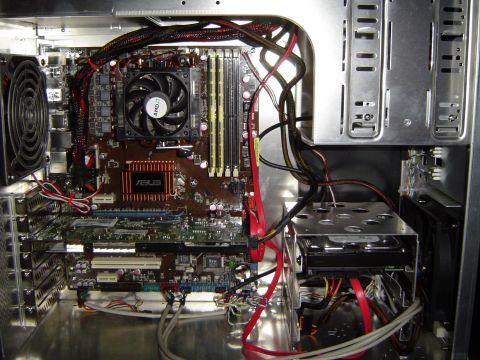 1989 Ford Bronco - A view inside a computer tower reveals its internal components, including the motherboard and storage devices.