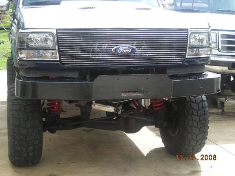 1993 Ford Bronco - A modified 1992 Ford Bronco is shown from the front, a chrome grille and a heavy-duty bumper.