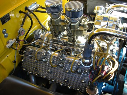 1998 Ford Crown Victoria - Engine bay detail dual carburetors and polished components.
