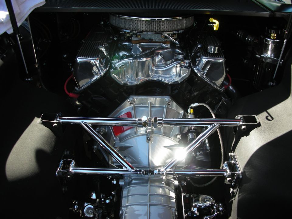 Chrome V8 engine with air cleaner, valve covers, and transmission housing