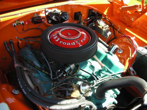 1998 Ford Crown Victoria - The engine bay is painted orange and features a prominent air cleaner with '383 Road Runner' text.