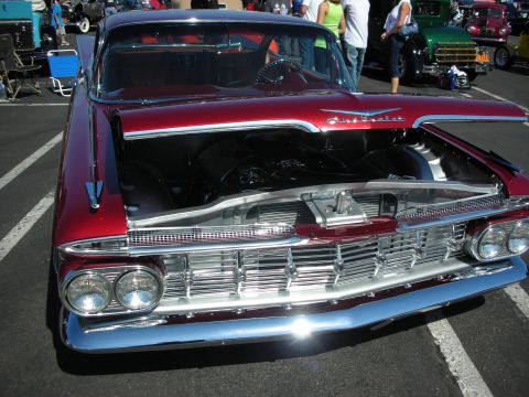 1998 Ford Crown Victoria - Custom 1959 Chevrolet Impala at a car show, hood up to display the engine.