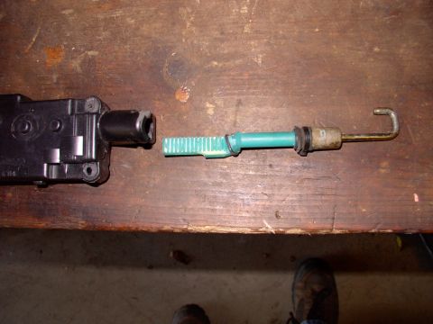 1990 Lincoln Town Car - You can see one side of the "snout" of the housing was partially broken allowing the hook's gear teeth loose,so it fell off. After I took i…