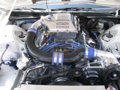 2003 Mercury Marauder - Close-up of a modified engine a prominent Vortech supercharger and polished components.