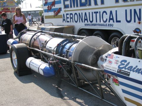 2003 Mercury Marauder - A jet dragster is parked next to a trailer with Embry-Riddle Aeronautical University branding.